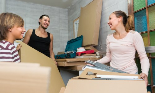Staff handling storage items safely at Spitalfields Storage