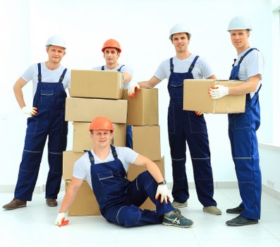 Professional movers transporting boxes in East London Spitalfields