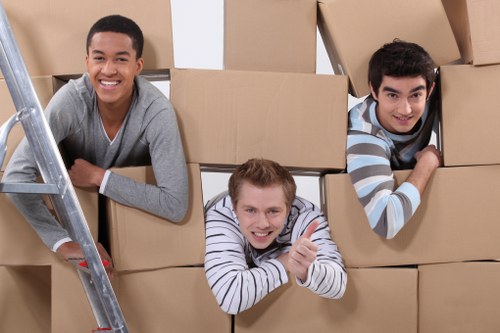 Protective wrapping and organized boxes during a flat removal in Spitalfields